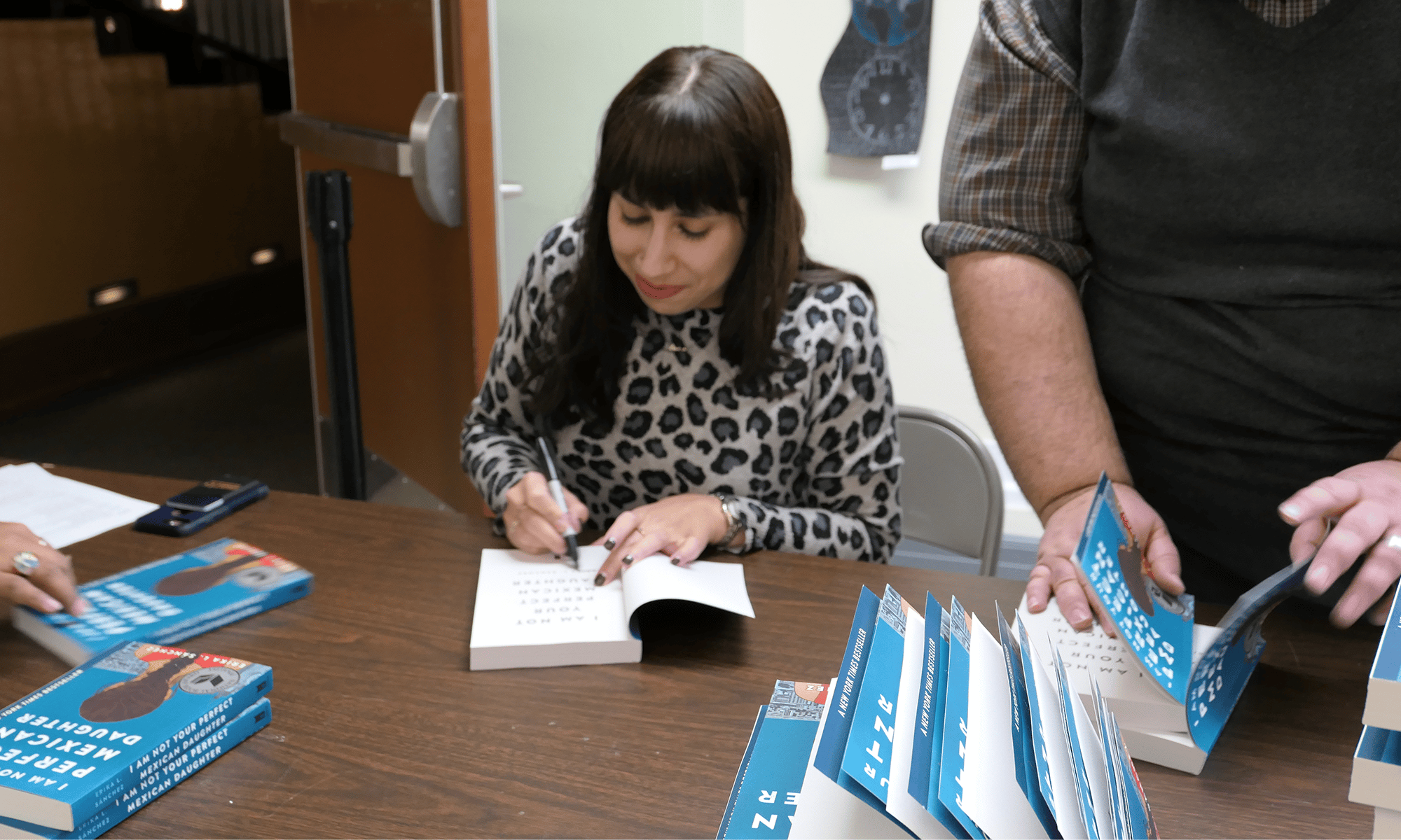 erika-l-sanchez-gallery-signing.png